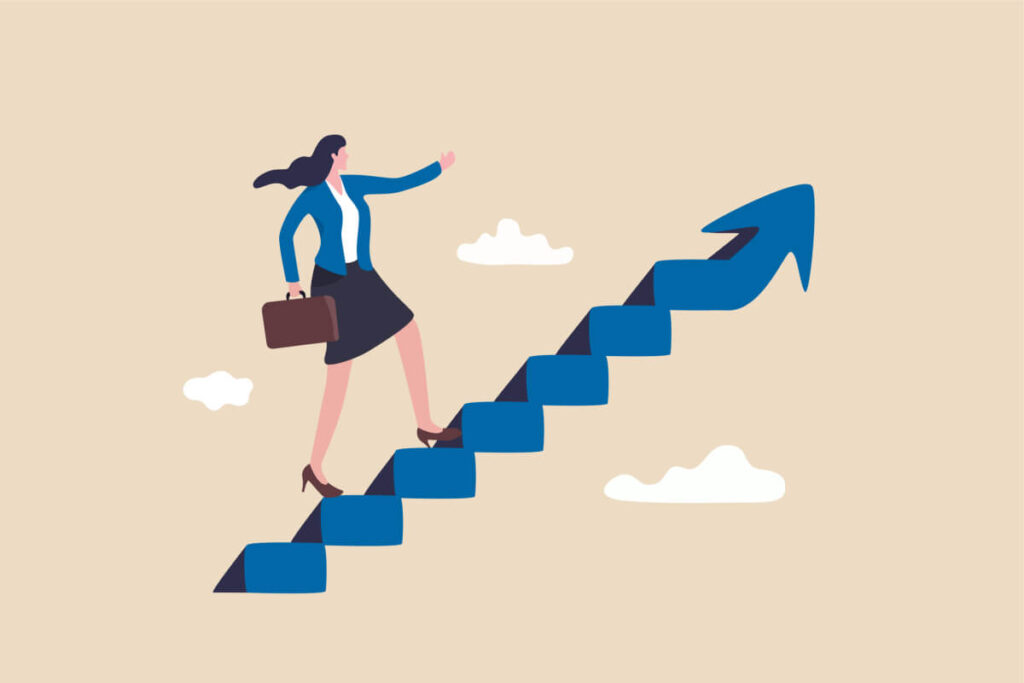 businesswoman take small step walking up staircase with arrow pointing up