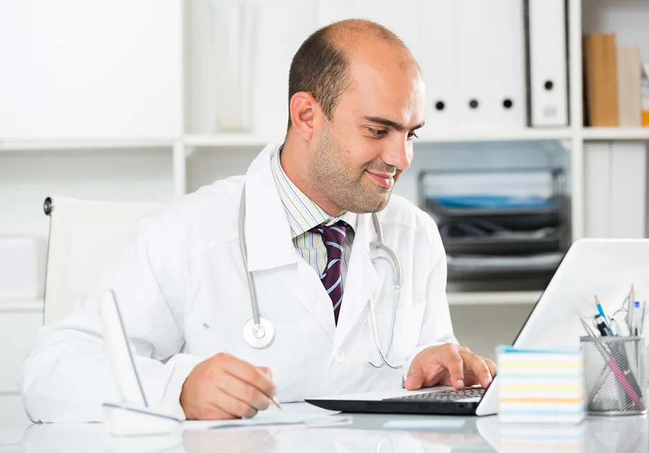 a medical doctor checking patients health record
