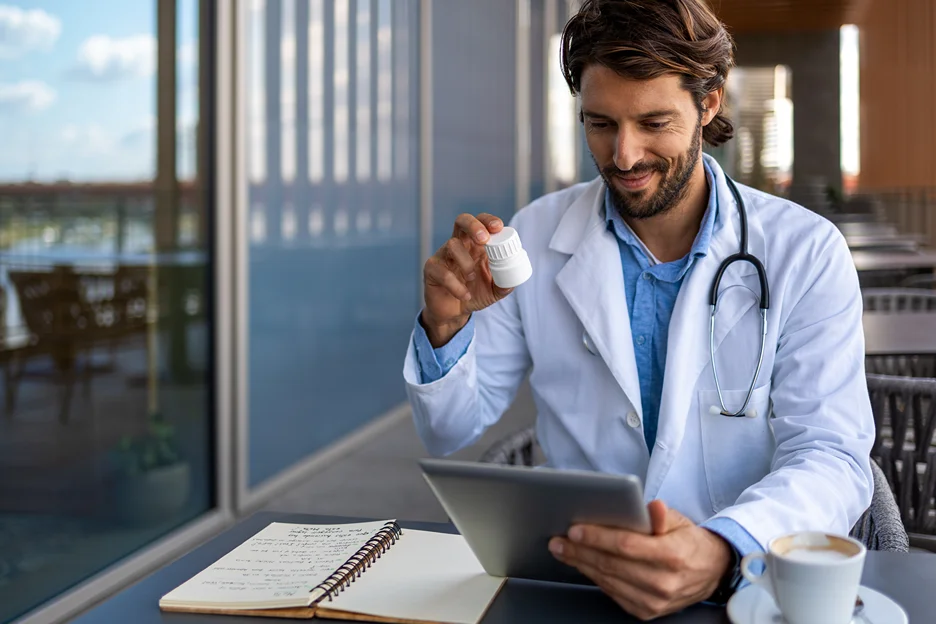 a doctor checking health records using emr