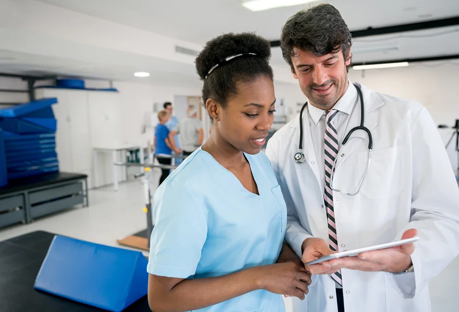 doctors checking health records using emr