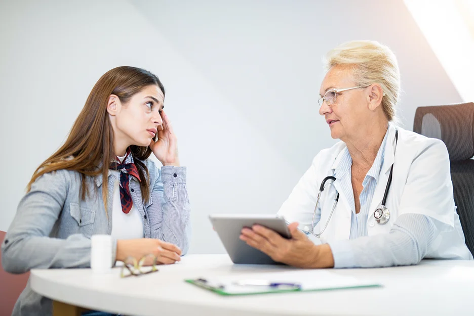 A Doctor and Patient Consult